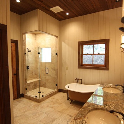 Example of a large mountain style master bathroom design in Charlotte with an undermount sink