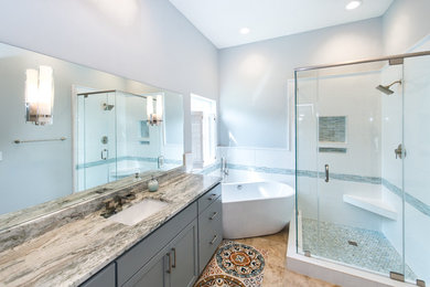 На фото: главная ванная комната в стиле неоклассика (современная классика) с фасадами в стиле шейкер, серыми фасадами, отдельно стоящей ванной, угловым душем, белой плиткой, плиткой кабанчик, врезной раковиной, столешницей из гранита и серыми стенами