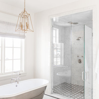 Mid-sized elegant master white tile and marble tile marble floor and white floor bathroom photo in Salt Lake City with recessed-panel cabinets, beige cabinets, white walls, an integrated sink, marble countertops, a hinged shower door and white countertops