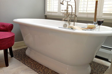 Inspiration for a transitional master porcelain tile porcelain tile freestanding bathtub remodel in Bridgeport with gray walls