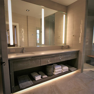 Mid-sized trendy master gray tile ceramic tile and gray floor walk-in shower photo in Other with open cabinets, gray cabinets, an undermount sink, concrete countertops and a hinged shower door