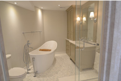 Inspiration for a mid-sized transitional master white tile and stone tile marble floor bathroom remodel in Montreal with shaker cabinets, green cabinets, a one-piece toilet, gray walls, an undermount sink and marble countertops