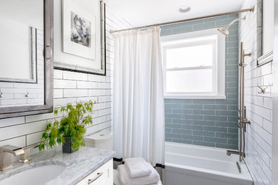 Inspiration for a timeless blue tile and subway tile mosaic tile floor bathroom remodel in Philadelphia with an undermount sink, white cabinets and gray countertops