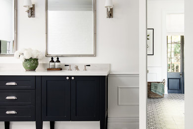 Design ideas for a classic bathroom in Sydney with shaker cabinets, a freestanding bath, a double shower, a one-piece toilet, white walls and a submerged sink.
