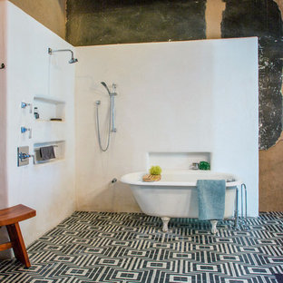 Bathroom - eclectic 3/4 ceramic tile and black floor bathroom idea in Other with multicolored walls