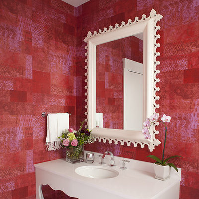 Example of an eclectic bathroom design in San Francisco with an undermount sink, furniture-like cabinets, white cabinets and red walls