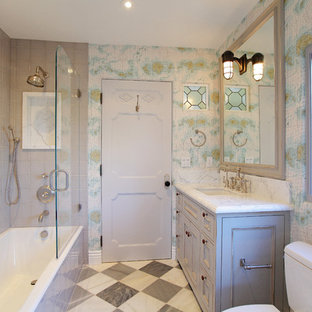 Example of a classic bathroom design in Los Angeles with marble countertops