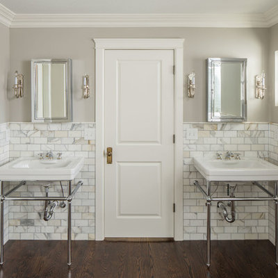 Example of a classic white tile and stone tile bathroom design in Salt Lake City with a console sink