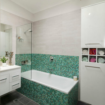 Inspiration for a mid-sized contemporary green tile and mosaic tile ceramic tile bathroom remodel in Canberra - Queanbeyan with flat-panel cabinets, white cabinets and quartz countertops