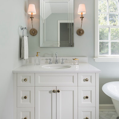 Inspiration for a large timeless master white tile and stone tile marble floor bathroom remodel in Minneapolis with recessed-panel cabinets, white cabinets, quartz countertops, gray walls and a console sink