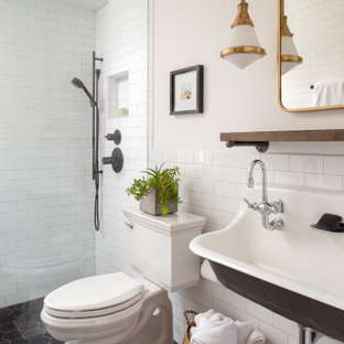Transitional 3/4 white tile and porcelain tile marble floor and black floor walk-in shower photo in DC Metro with white walls and a trough sink
