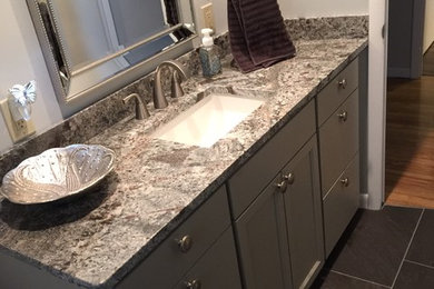 Inspiration for a contemporary bathroom remodel in Philadelphia with granite countertops