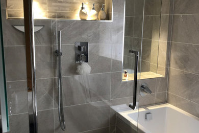 This is an example of a contemporary bathroom in West Midlands.