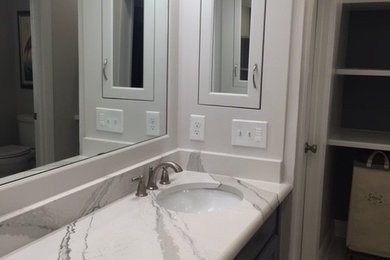 New recessed medicine cabinets. New large framed mirror
