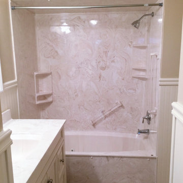 New tub/shower upgrade with matching accessories, grab bars.