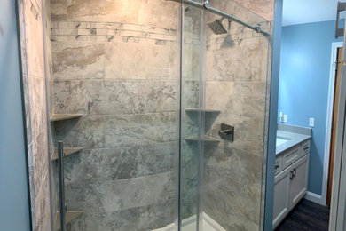Example of a mid-sized trendy master blue tile and porcelain tile single-sink bathroom design in Other with recessed-panel cabinets, white cabinets, quartzite countertops, gray countertops and a built-in vanity