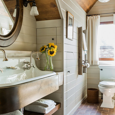 Bathroom - mid-sized country brick floor bathroom idea in Boston with a trough sink