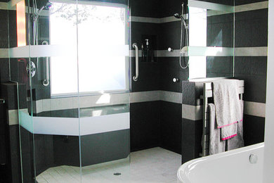 Inspiration for a large contemporary master black tile and stone tile bathroom remodel in New York