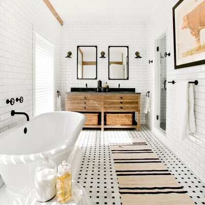Example of a large country master white tile and ceramic tile mosaic tile floor and white floor bathroom design in New York with furniture-like cabinets, brown cabinets, a wall-mount toilet, white walls, a drop-in sink and granite countertops