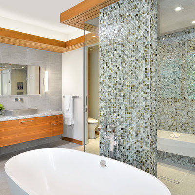 Huge trendy master multicolored tile and mosaic tile porcelain tile bathroom photo in Toronto with a vessel sink, flat-panel cabinets, medium tone wood cabinets, beige walls and a two-piece toilet