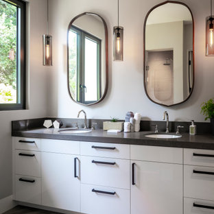 Large trendy master marble floor, gray floor and double-sink bathroom photo in San Francisco with flat-panel cabinets, white cabinets, an undermount sink, quartz countertops, a built-in vanity, gray walls and gray countertops