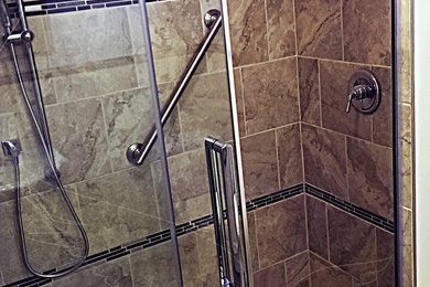 Example of a large trendy 3/4 multicolored tile and ceramic tile ceramic tile double shower design in Toronto with an undermount sink, a two-piece toilet and beige walls