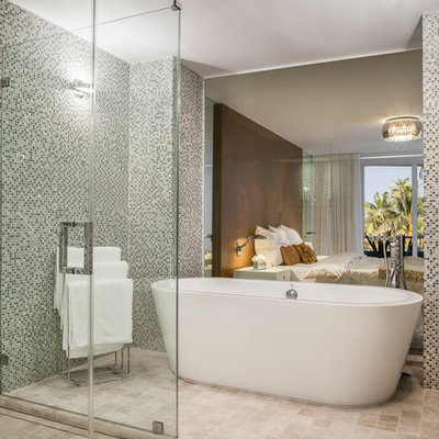 Inspiration for a large contemporary master beige tile and cement tile bathroom remodel in Miami with a one-piece toilet, gray walls and a wall-mount sink