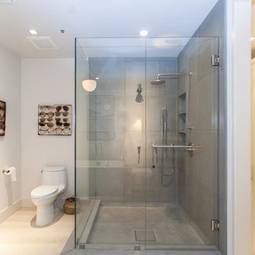 Ocean View Condomineum Bathroom  with Concrete Shower and Vanities