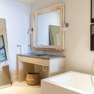 Ocean View Condomineum Bathroom  with Concrete Shower and Vanities