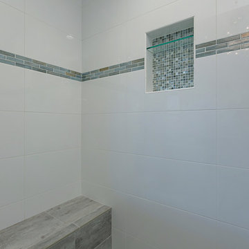 Oceanside Master Bathroom with Shower Bench and Tile Niche