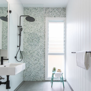Contemporary master bathroom in Sydney with green tile, marble, white walls, ceramic floors, a wall-mount sink, a curbless shower, grey floor and an open shower.
