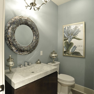 Trendy bathroom photo in Columbus with an integrated sink, flat-panel cabinets, dark wood cabinets and a two-piece toilet
