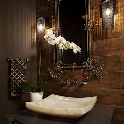 Transitional bathroom photo in Minneapolis with a vessel sink, brown walls and brown countertops