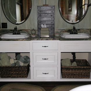 Inspiration for a large craftsman master bathroom remodel in Minneapolis with a drop-in sink, open cabinets, white cabinets, granite countertops and multicolored walls