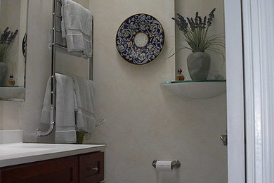 Inspiration for a mid-sized transitional 3/4 mosaic tile floor bathroom remodel in San Francisco with flat-panel cabinets, dark wood cabinets, white walls, quartz countertops, a one-piece toilet and an undermount sink