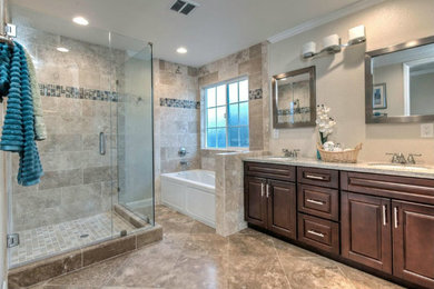 Inspiration for a mid-sized transitional master beige tile, blue tile and mosaic tile ceramic tile and beige floor bathroom remodel in Toronto with raised-panel cabinets, dark wood cabinets, a two-piece toilet, beige walls, an undermount sink, quartz countertops and a hinged shower door