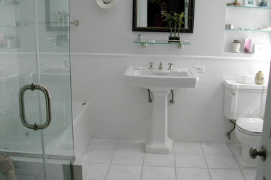 Mid-sized elegant 3/4 white tile and subway tile ceramic tile bathroom photo in Orange County with a one-piece toilet, white walls, a pedestal sink and solid surface countertops