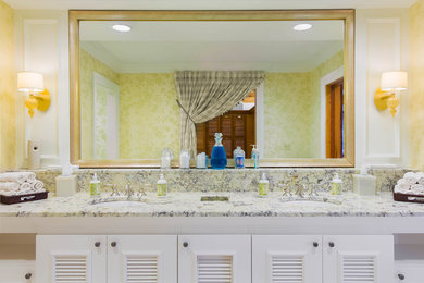 Inspiration for a large timeless master bathroom remodel in Charleston with louvered cabinets, white cabinets, yellow walls and an undermount sink