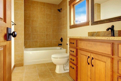 Inspiration for a large master beige tile ceramic tile bathroom remodel in Other with recessed-panel cabinets, medium tone wood cabinets and white walls