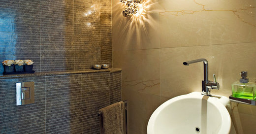 16 Bathroom Light Fixtures That Radiate Style