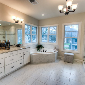 Owners' Bathroom w/Dual Granite Vanity and Large Soaker Tub