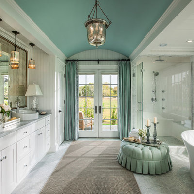 Elegant white tile mosaic tile floor bathroom photo in Atlanta with a vessel sink, shaker cabinets, white cabinets and white walls