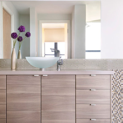 Bathroom - mid-sized contemporary multicolored tile and mosaic tile ceramic tile bathroom idea in Miami with white walls, a vessel sink, flat-panel cabinets and light wood cabinets