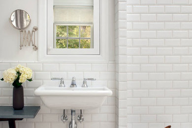 Small transitional white tile and ceramic tile ceramic tile bathroom photo in San Francisco with a wall-mount sink, an undermount tub and white walls
