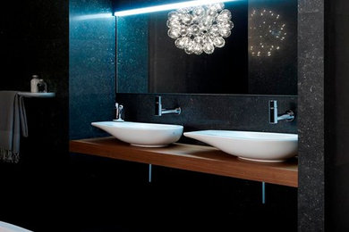 This is an example of a contemporary bathroom in Other with a freestanding bath.