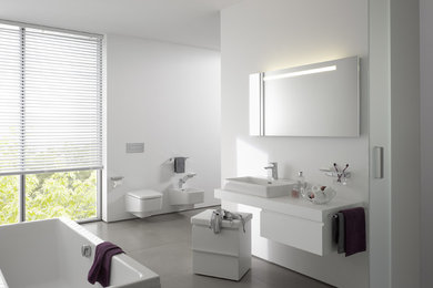 Inspiration for a contemporary bathroom in Other with a freestanding bath.