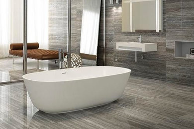 Example of a mid-sized minimalist master porcelain tile freestanding bathtub design in Nashville with open cabinets, beige walls and an integrated sink