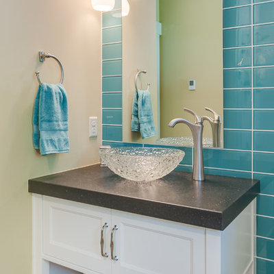 Example of a mid-sized eclectic kids' blue tile and glass tile porcelain tile bathroom design in Grand Rapids with a vessel sink, shaker cabinets, white cabinets, granite countertops, a two-piece toilet and green walls