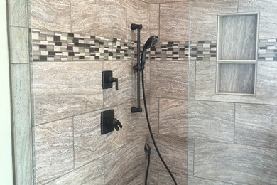 Example of a mid-sized transitional master beige tile and porcelain tile porcelain tile bathroom design in Other with beige walls