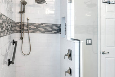 Inspiration for a mid-sized contemporary master beige tile, brown tile and ceramic tile porcelain tile and brown floor alcove shower remodel in New York with flat-panel cabinets, brown cabinets, a two-piece toilet, beige walls, a drop-in sink, solid surface countertops and a hinged shower door